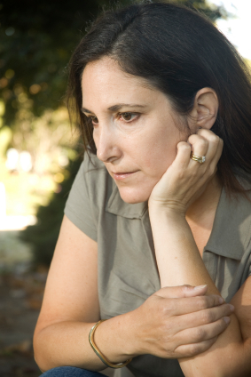 http://divorcedetox.com/blog/wp-content/uploads/2010/07/sad-woman-divorce-detox1.jpg